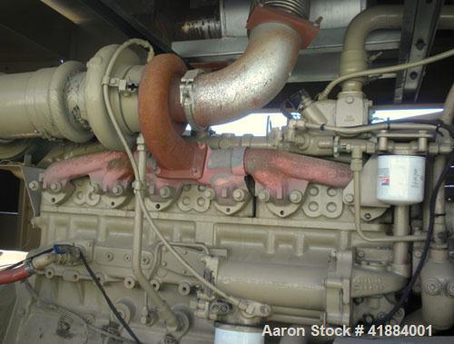 Used Cummins 200 kW standby diesel generator set. Cummins model NT-855-G4 engine, serial# 1161-7668, Rated 375 hp @ 1800 rpm. 3/60/208-240/380-480 volt generator end ID # 200DFBC/38795F. Battery char...