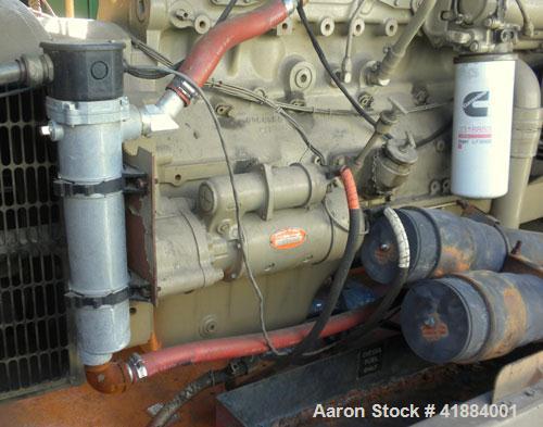 Used Cummins 200 kW standby diesel generator set. Cummins model NT-855-G4 engine, serial# 1161-7668, Rated 375 hp @ 1800 rpm. 3/60/208-240/380-480 volt generator end ID # 200DFBC/38795F. Battery char...
