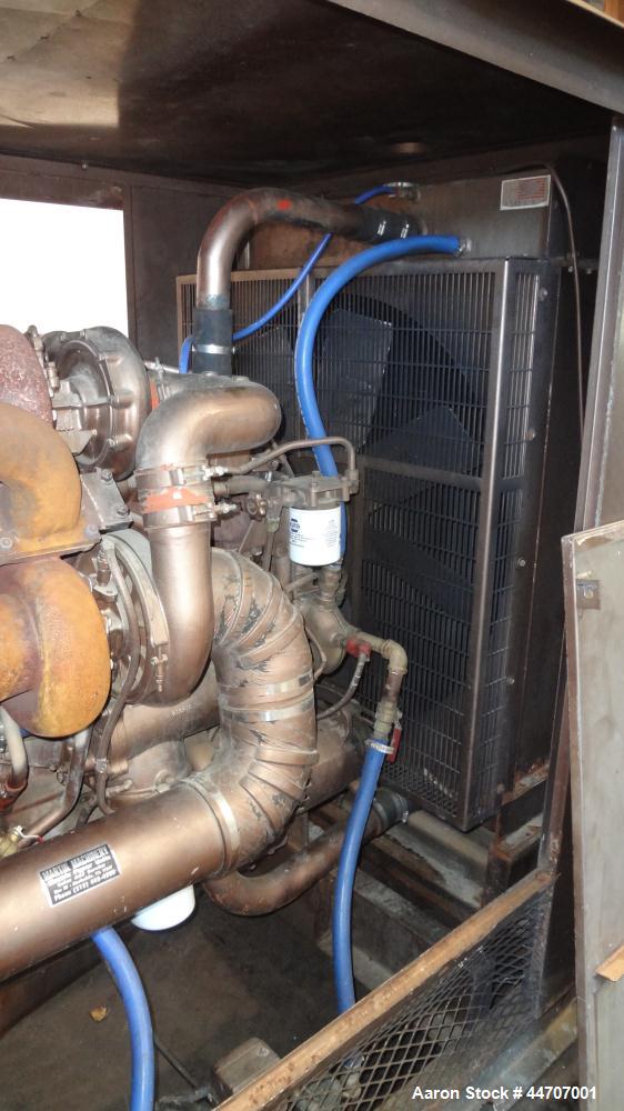 Used Cummins 350 kW standby diesel generator set, Cummins NTTA855G2 engine rated 535 HP @ 1800 RPM, SN-18109439. 3/60/277/480V. 600 Amp main line circuit breaker. Weather enclosure. 215 Hours. Year 1...