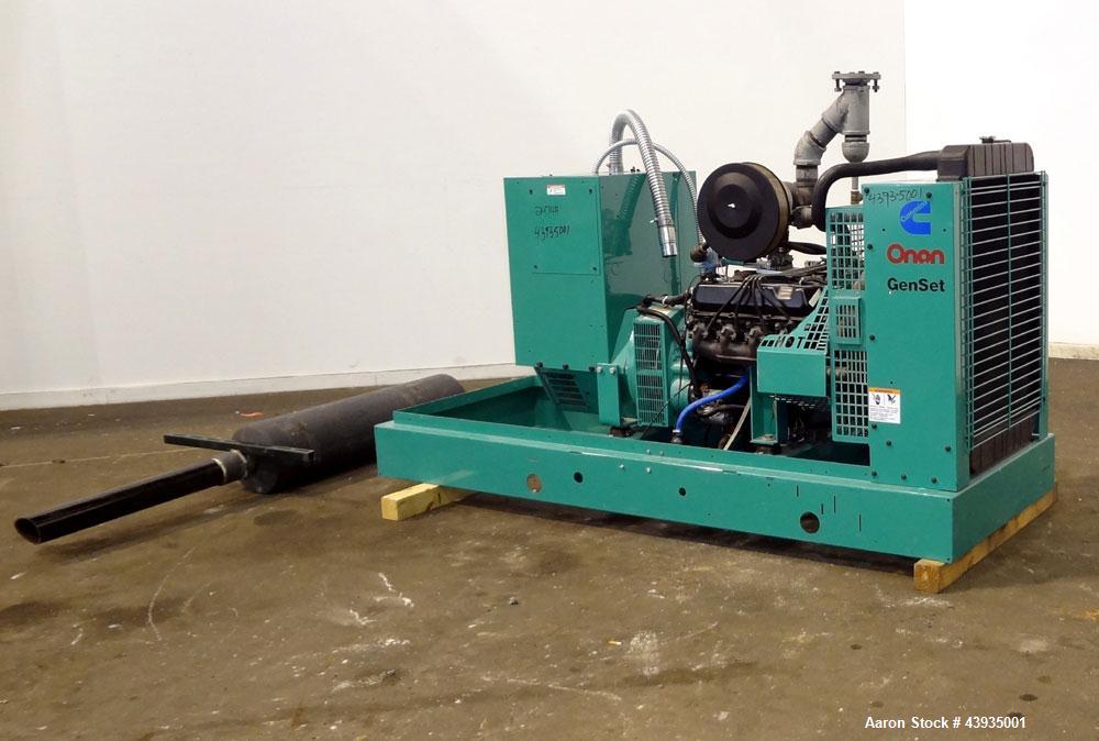 Used Cummins / Onan 80 kW Standby Natural Gas Generator Set, Model 80GGHC-67, Serial E990909239. Ford LSG-875I-6005-A engine, serial 13606-1-04-98. 3/60/277/480. 150 Amp mainline circuit breaker. Coo...