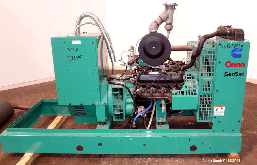 Used Cummins / Onan 80 kW Standby Natural Gas Generator Set, Model 80GGHC-67, Serial E990909239. Ford LSG-875I-6005-A engine, serial 13606-1-04-98. 3/60/277/480. 150 Amp mainline circuit breaker. Coo...