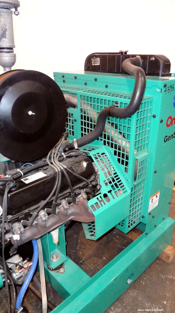 Used Cummins / Onan 80 kW Standby Natural Gas Generator Set, Model 80GGHC-67, Serial E990909239. Ford LSG-875I-6005-A engine, serial 13606-1-04-98. 3/60/277/480. 150 Amp mainline circuit breaker. Coo...