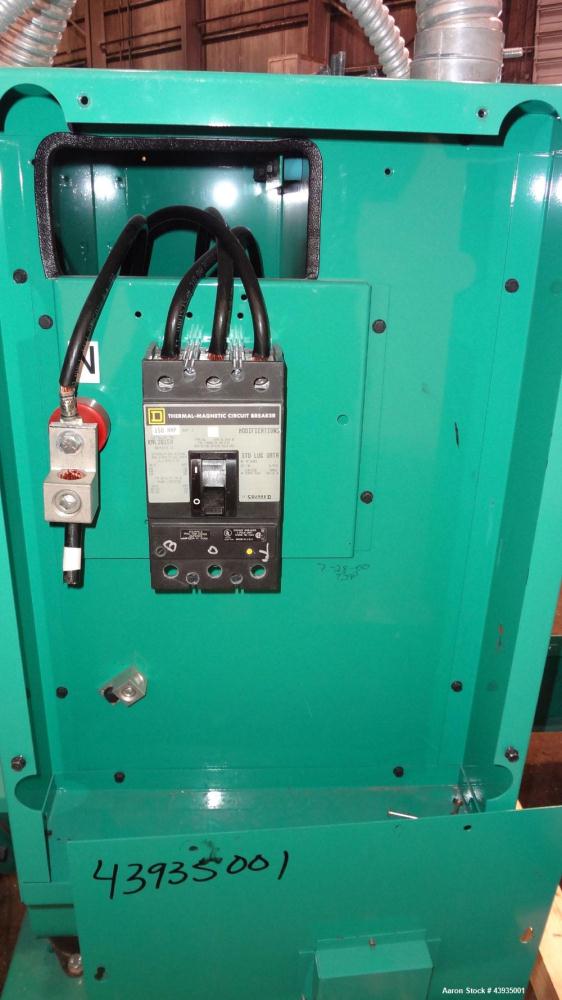 Used Cummins / Onan 80 kW Standby Natural Gas Generator Set, Model 80GGHC-67, Serial E990909239. Ford LSG-875I-6005-A engine, serial 13606-1-04-98. 3/60/277/480. 150 Amp mainline circuit breaker. Coo...
