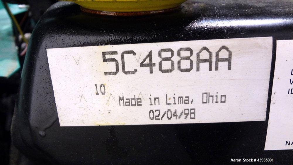 Used Cummins / Onan 80 kW Standby Natural Gas Generator Set, Model 80GGHC-67, Serial E990909239. Ford LSG-875I-6005-A engine, serial 13606-1-04-98. 3/60/277/480. 150 Amp mainline circuit breaker. Coo...