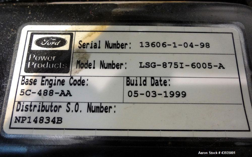 Used Cummins / Onan 80 kW Standby Natural Gas Generator Set, Model 80GGHC-67, Serial E990909239. Ford LSG-875I-6005-A engine, serial 13606-1-04-98. 3/60/277/480. 150 Amp mainline circuit breaker. Coo...
