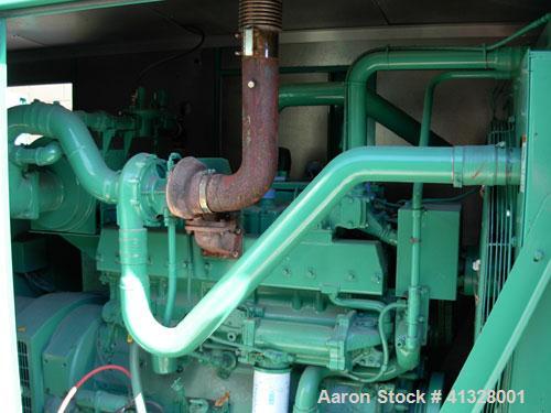 Used Cummins 215 kW natural gas generator set. Cummins GTA855-GS/GC2 engine. 3/60/277/480V, main-line circuit breaker 1200 amp. Sound attenuated enclosure. 179 hours. Yr 2001.
