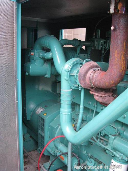 Used Cummins 215 kW natural gas generator set. Cummins GTA855-GS/GC2 engine. 3/60/277/480V, main-line circuit breaker 1200 amp. Sound attenuated enclosure. 179 hours. Yr 2001.