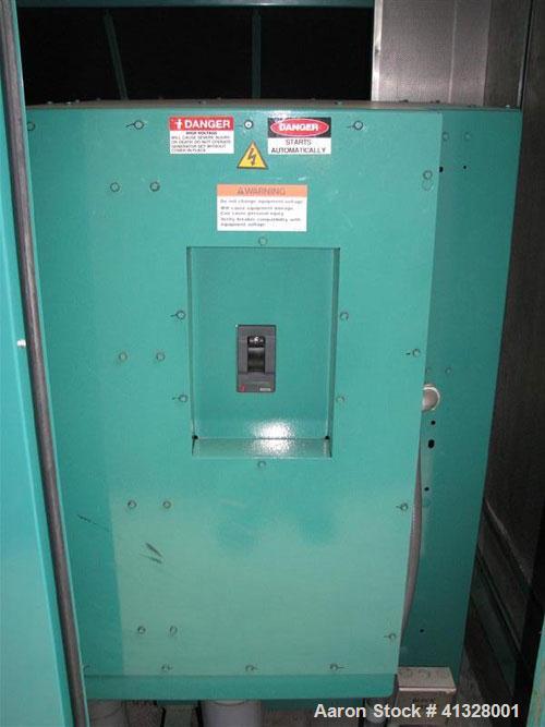 Used Cummins 215 kW natural gas generator set. Cummins GTA855-GS/GC2 engine. 3/60/277/480V, main-line circuit breaker 1200 amp. Sound attenuated enclosure. 179 hours. Yr 2001.