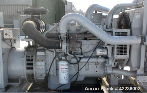 Used Detroit Diesel / Spectrum 150 kW standby generator set. Model 150DS60 SN-387426. 3/60/277/480V.Main-line curcuit breaker. Battery charger, block heater, sub-base fuel tank, muffler. 275Hrs,
