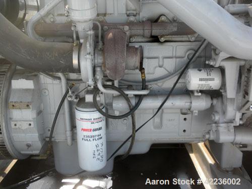 Used Detroit Diesel / Spectrum 150 kW standby generator set. Model 150DS60 SN-387426. 3/60/277/480V.Main-line curcuit breaker. Battery charger, block heater, sub-base fuel tank, muffler. 275Hrs,