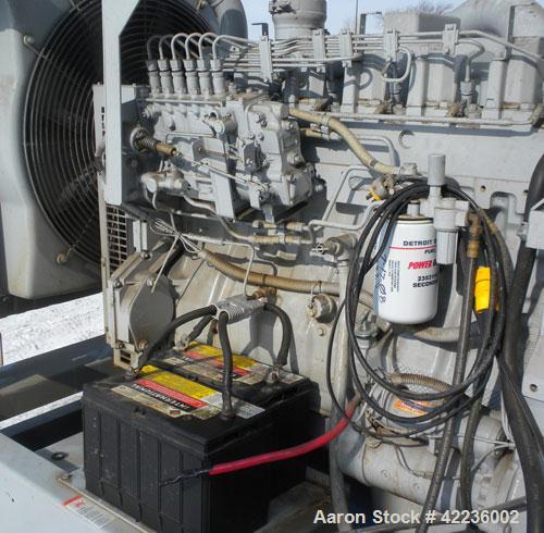 Used Detroit Diesel / Spectrum 150 kW standby generator set. Model 150DS60 SN-387426. 3/60/277/480V.Main-line curcuit breaker. Battery charger, block heater, sub-base fuel tank, muffler. 275Hrs,