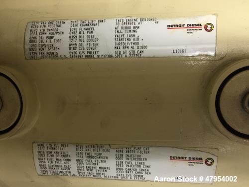 Used Detroit 1000 kW diesel generator set. Open skid unit.