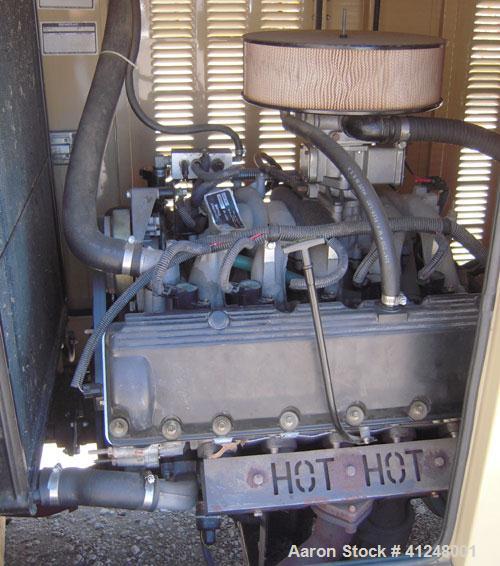 Used Generac 100kW natural gas generator set. Generac 2000 series model 3031950200. Ford 6.8L engine model OD 3454. 3/60/120/208V. 400 amp main line circuit breaker. Includes a battery charger. 97.1 ...