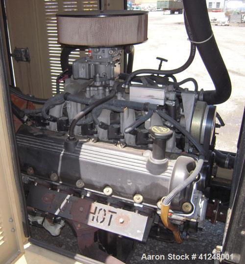 Used Generac 100kW natural gas generator set. Generac 2000 series model 3031950200. Ford 6.8L engine model OD 3454. 3/60/120/208V. 400 amp main line circuit breaker. Includes a battery charger. 97.1 ...