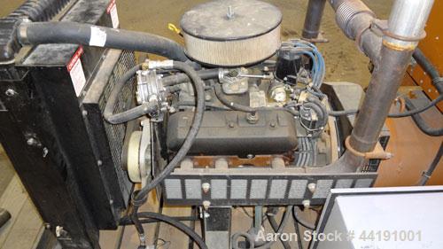 Used Generac 45 kW Natural Gas Generator Set. Generac model 98A06656-S, serial #2045168. Generac 4.3L engine. 3/60/120/240V. 100 Amp mainline circuit breaker. Battery charger. Muffler ships loose. 32...