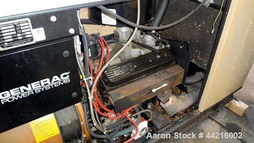 Used Generac 50 kW prime rated natural gas generator set, model DG 50 SN-3675472. Generac 5.7L engine rated 74 HP @ 1800 RPM. 3/60/120/208V. 200 Amp main-line circuit breaker. Weather enclosure. 22 h...
