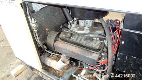 Used Generac 50 kW prime rated natural gas generator set, model DG 50 SN-3675472. Generac 5.7L engine rated 74 HP @ 1800 RPM. 3/60/120/208V. 200 Amp main-line circuit breaker. Weather enclosure. 22 h...