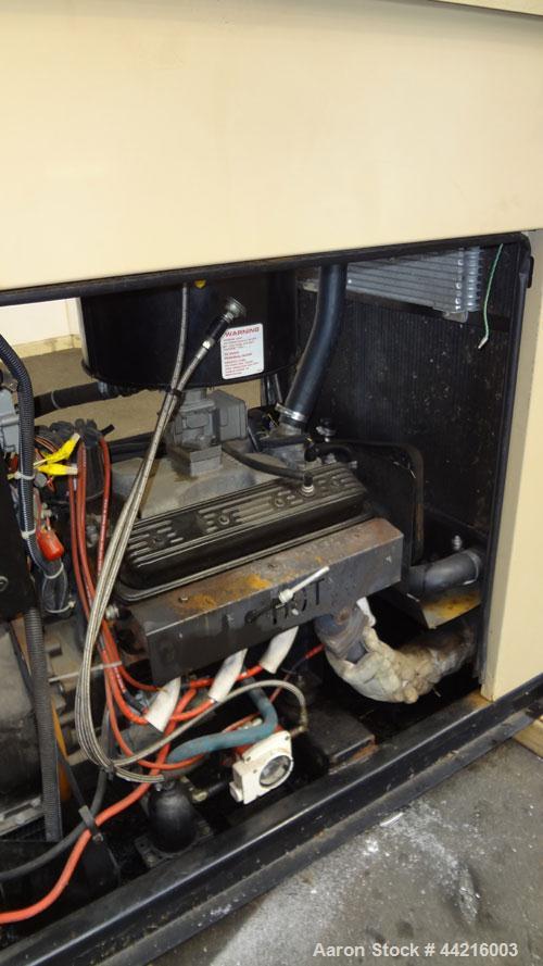 Used Generac 50 kW prime rated natural gas generator set, model DG 50 SN-3664156. Generac 5.7L engine rated 74 HP @ 1800 RPM. 3/60/120/208V. 200 Amp main-line circuit breaker. Weather enclosure. 115 ...