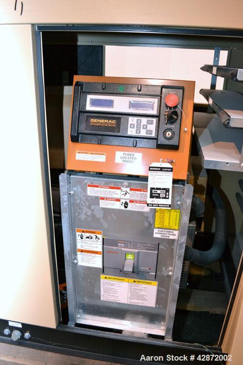 Used Generac 100 kW Natural Gas Generator Set,Model QT10054ANSN Serial 4846527, 1/60/120/240V. 450 Amp main-line circuit breaker. Weather Enclosure, Year 2007, 0.6 Hours.Load tested 1/4/2012.