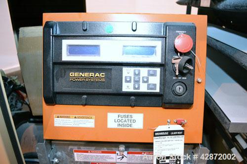 Used Generac 100 kW Natural Gas Generator Set,Model QT10054ANSN Serial 4846527, 1/60/120/240V. 450 Amp main-line circuit breaker. Weather Enclosure, Year 2007, 0.6 Hours.Load tested 1/4/2012.
