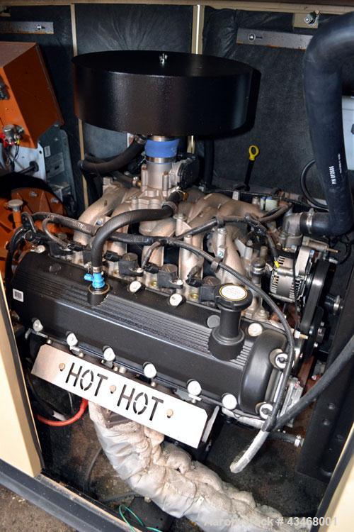 Used Generac 100 kW natural gas generator set.Model QT10068JNSN 125 KVA SN-4898862, 3/60 120/240V. 350 Amp main-line circuit breaker. Weather enclosure.UL listed generator assembly. Yr 2007.