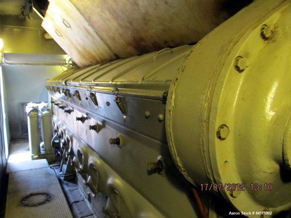 Used General Motors 2000 kW Diesel Generator Set.  EMD Model 16-567-FD4 engine, rated 2875 hp @ 900 rpm, serial #70-M3-1122.  3/60/4160V.  Weather enclosure.  125 Gallon day tank. Control building wi...