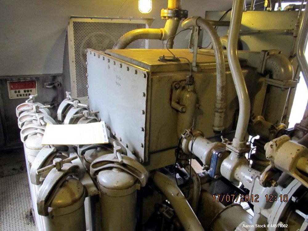 Used General Motors 2000 kW Diesel Generator Set.  EMD Model 16-567-FD4 engine, rated 2875 hp @ 900 rpm, serial #70-M3-1122.  3/60/4160V.  Weather enclosure.  125 Gallon day tank. Control building wi...