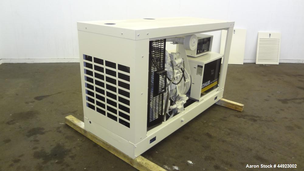 Used Kohler 30kW standby (27 kW Prime) natural gas generator set, model 30RZ202, SN-320614. Ford CSG-649 engine rated 82 HP at 1800 RPM. 1/60/120/240V. PMG (permanent magnet generator). Weather enclo...