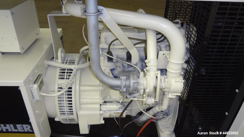Used Kohler 30kW standby (27 kW Prime) natural gas generator set, model 30RZ202, SN-320614. Ford CSG-649 engine rated 82 HP at 1800 RPM. 1/60/120/240V. PMG (permanent magnet generator). Weather enclo...