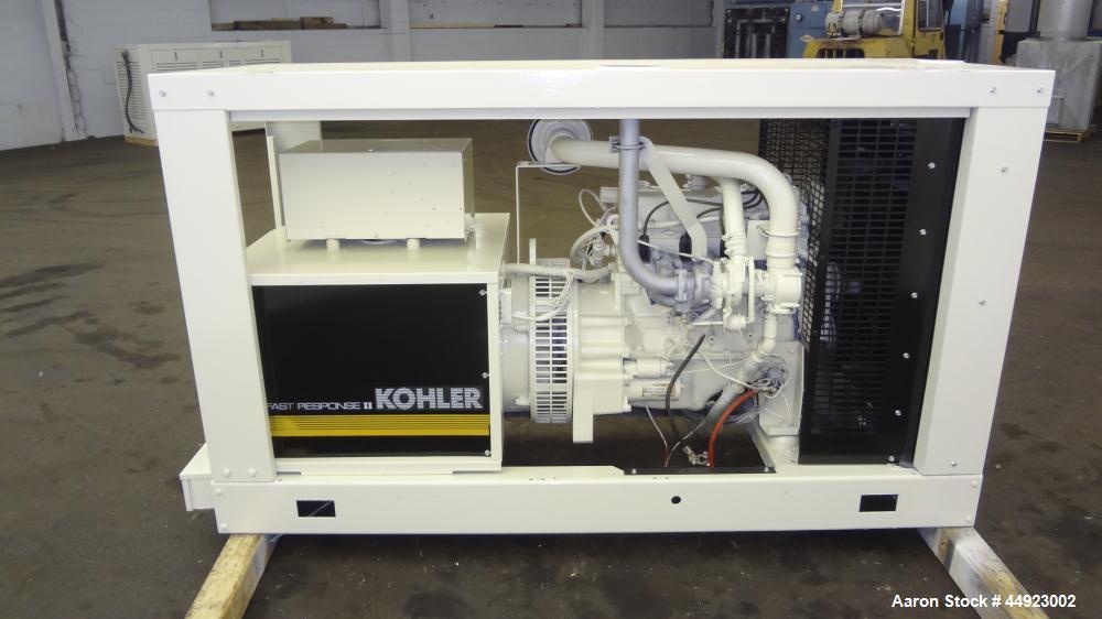 Used Kohler 30kW standby (27 kW Prime) natural gas generator set, model 30RZ202, SN-320614. Ford CSG-649 engine rated 82 HP at 1800 RPM. 1/60/120/240V. PMG (permanent magnet generator). Weather enclo...