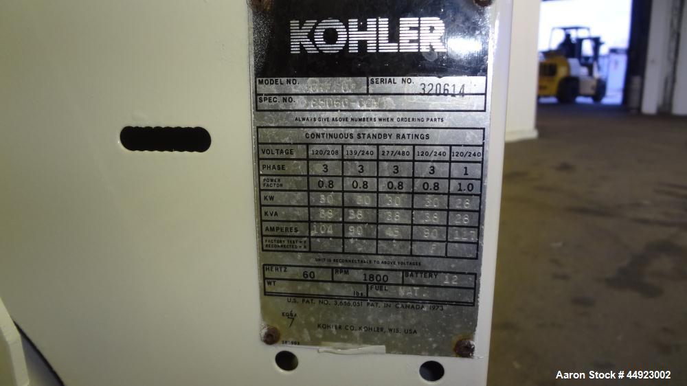 Used Kohler 30kW standby (27 kW Prime) natural gas generator set, model 30RZ202, SN-320614. Ford CSG-649 engine rated 82 HP at 1800 RPM. 1/60/120/240V. PMG (permanent magnet generator). Weather enclo...