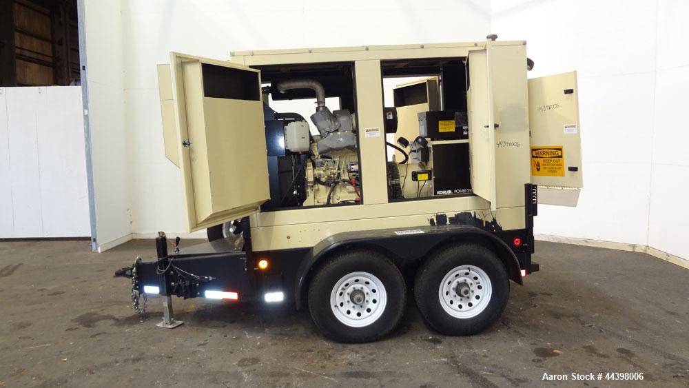 Used Kohler 55 kW Standby (50 kW prime) Diesel Generator Set, portable / trailer mounted, model 50REOZJB, serial #2145835.  John Deere 4045TF270 engine rated 110 hp @ 1800 rpm, serial #PE4045T656697,...