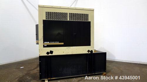 Used Kohler 62 kW standby diesel generator set, model 60REOZJB, SN-2104402. John Deere 4045T150 engine rated 110 HP @ 1800 RPM, emissions EPA tier 2 certified. 3/60/120/240V with PMG permanent magnet...