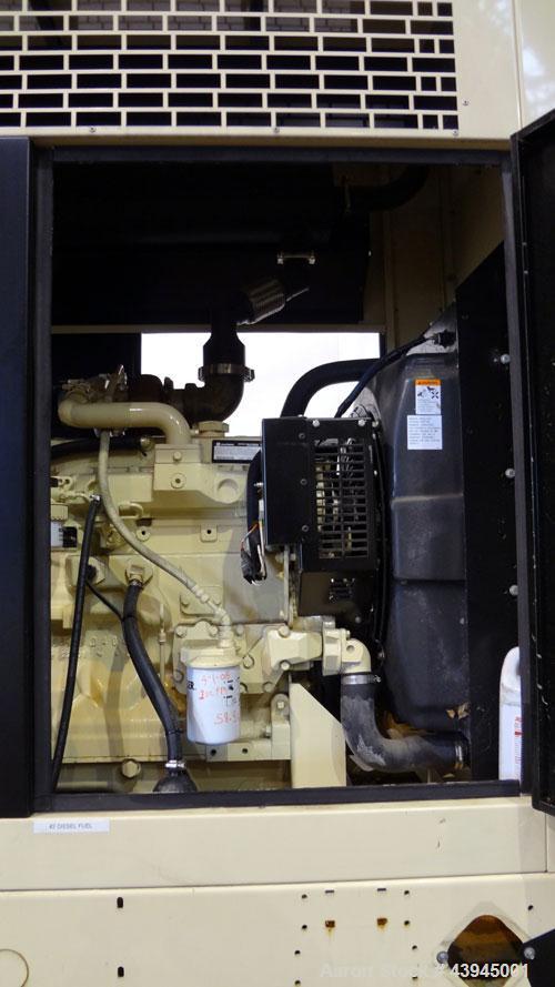 Used Kohler 62 kW standby diesel generator set, model 60REOZJB, SN-2104402. John Deere 4045T150 engine rated 110 HP @ 1800 RPM, emissions EPA tier 2 certified. 3/60/120/240V with PMG permanent magnet...