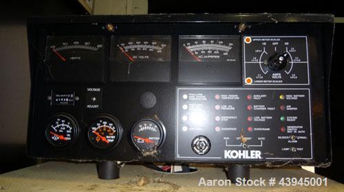Used Kohler 62 kW standby diesel generator set, model 60REOZJB, SN-2104402. John Deere 4045T150 engine rated 110 HP @ 1800 RPM, emissions EPA tier 2 certified. 3/60/120/240V with PMG permanent magnet...