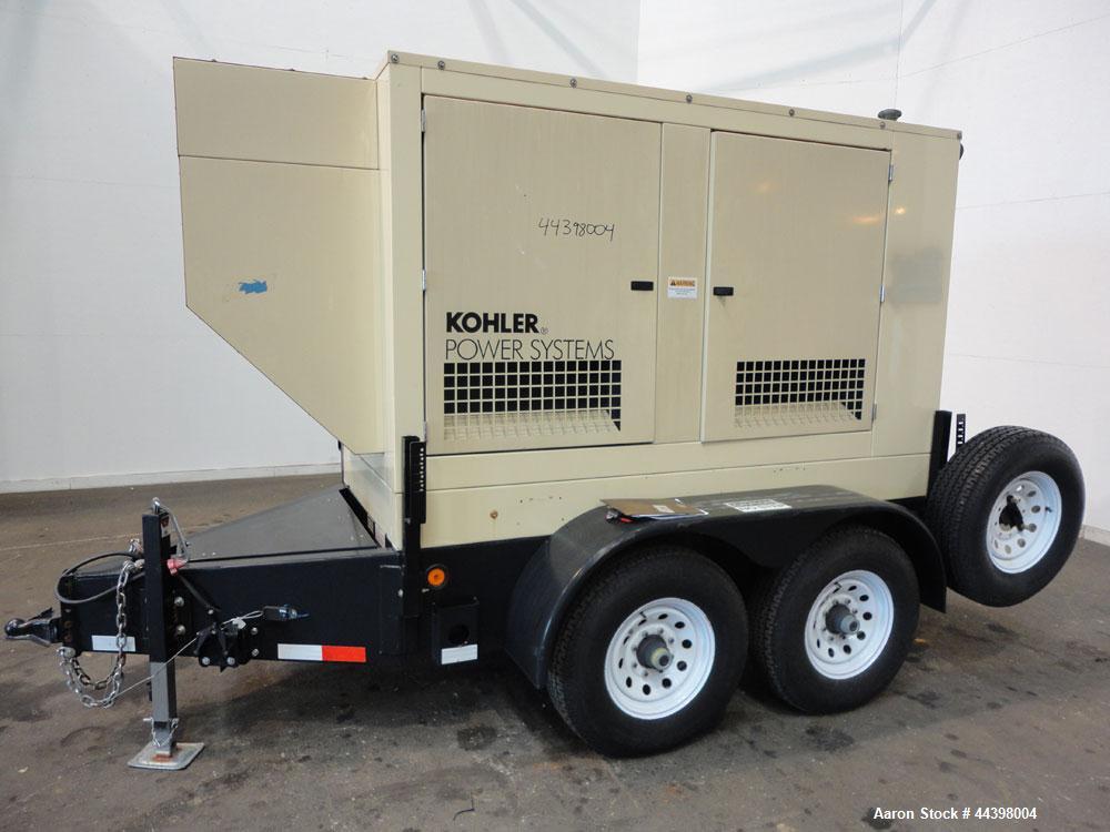 Used Kohler 62 kW standby (57 kW prime) diesel generator set, portable / trailer mounted, model 60REOZJB, SN-2131295. John Deere model 4045TF270 engine rated 110 HP @ 1800 RPM, SN-PE4045T608511, emis...