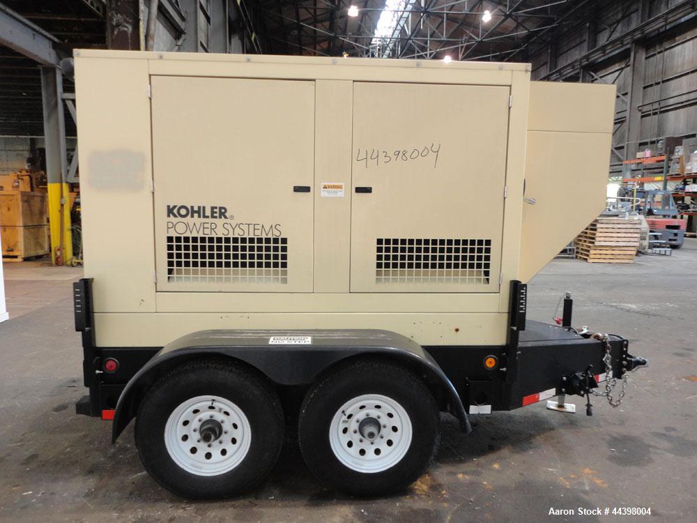 Used Kohler 62 kW standby (57 kW prime) diesel generator set, portable / trailer mounted, model 60REOZJB, SN-2131295. John Deere model 4045TF270 engine rated 110 HP @ 1800 RPM, SN-PE4045T608511, emis...