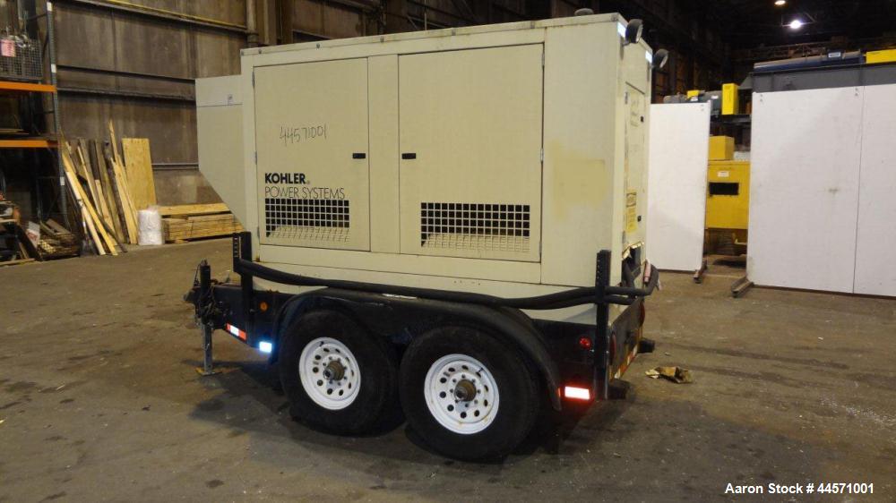 Used Kohler 54 kW standby (50 kW prime) rated diesel generator set, trailer mounted, model 60REOZJB, SN-791303. John Deere 4045TF270 engine rated 110 HP @ 1800 RPM, emissions EPA tier 2 certified, SN...