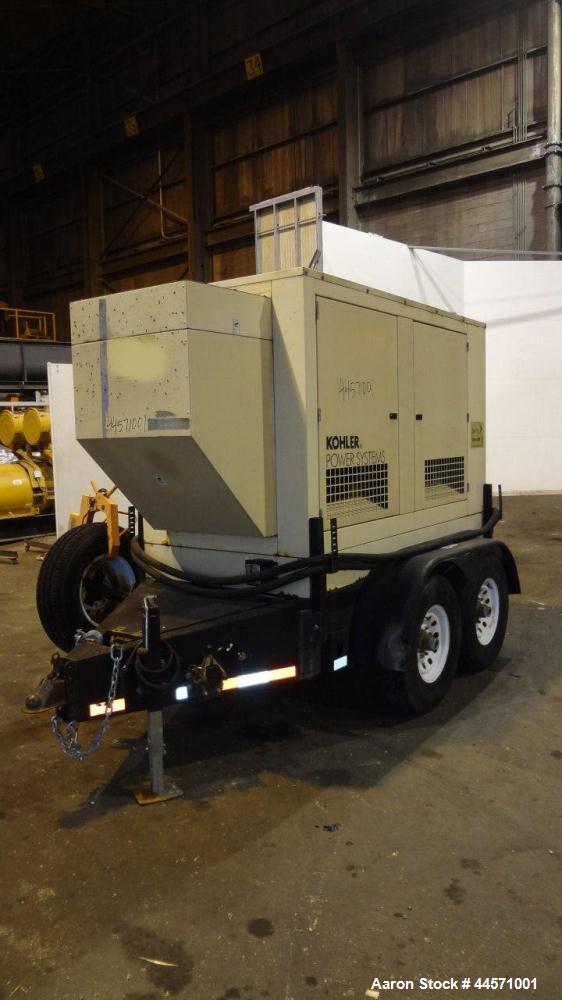 Used Kohler 54 kW standby (50 kW prime) rated diesel generator set, trailer mounted, model 60REOZJB, SN-791303. John Deere 4045TF270 engine rated 110 HP @ 1800 RPM, emissions EPA tier 2 certified, SN...