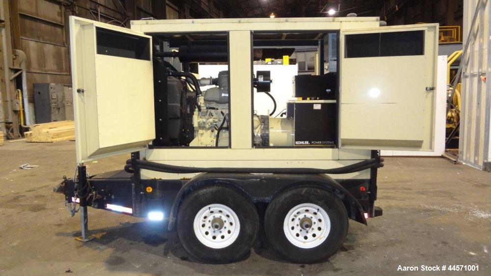 Used Kohler 54 kW standby (50 kW prime) rated diesel generator set, trailer mounted, model 60REOZJB, SN-791303. John Deere 4045TF270 engine rated 110 HP @ 1800 RPM, emissions EPA tier 2 certified, SN...