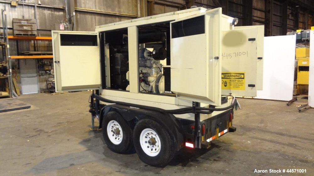 Used Kohler 54 kW standby (50 kW prime) rated diesel generator set, trailer mounted, model 60REOZJB, SN-791303. John Deere 4045TF270 engine rated 110 HP @ 1800 RPM, emissions EPA tier 2 certified, SN...
