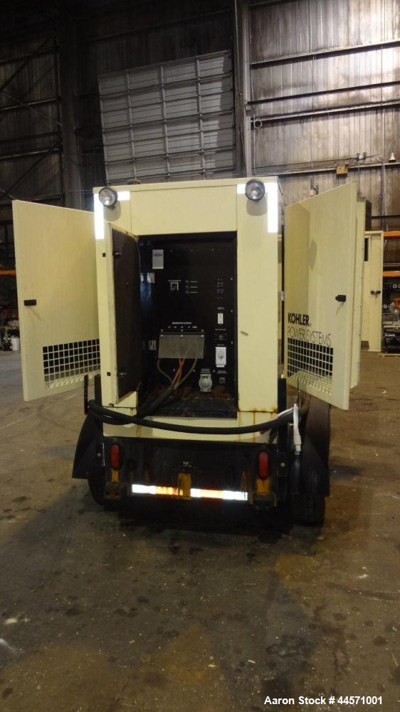 Used Kohler 54 kW standby (50 kW prime) rated diesel generator set, trailer mounted, model 60REOZJB, SN-791303. John Deere 4045TF270 engine rated 110 HP @ 1800 RPM, emissions EPA tier 2 certified, SN...