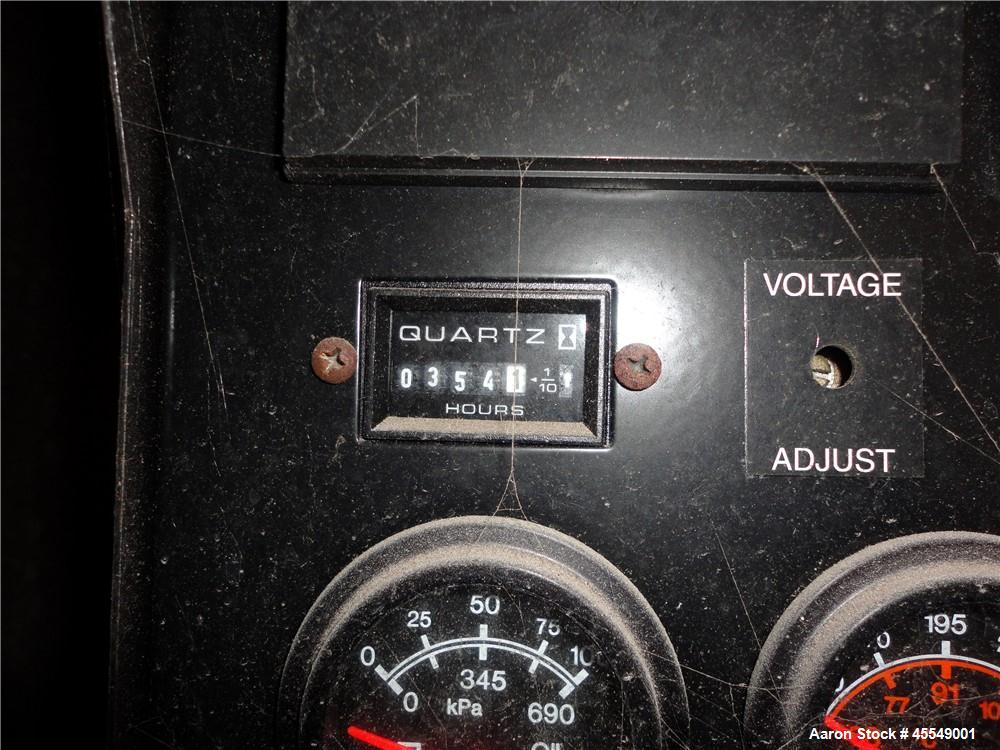 Used John Deere / Kohler 61 kW diesel generator, model 60REOZJB. John Deere 404