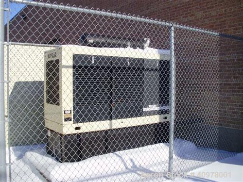 Used Kohler 80 kW diesel generator set, model 80REOZ. 3/60/277-480V. Includes Asco ATS, battery charger, block heater, weather enclosure, muffler and sub-base fuel tank. 51 hours. Year 2000.