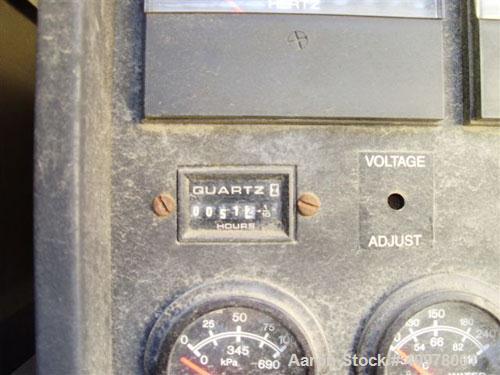 Used Kohler 80 kW diesel generator set, model 80REOZ. 3/60/277-480V. Includes Asco ATS, battery charger, block heater, weather enclosure, muffler and sub-base fuel tank. 51 hours. Year 2000.