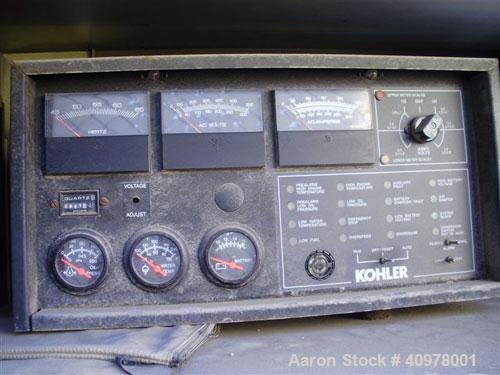 Used Kohler 80 kW diesel generator set, model 80REOZ. 3/60/277-480V. Includes Asco ATS, battery charger, block heater, weather enclosure, muffler and sub-base fuel tank. 51 hours. Year 2000.