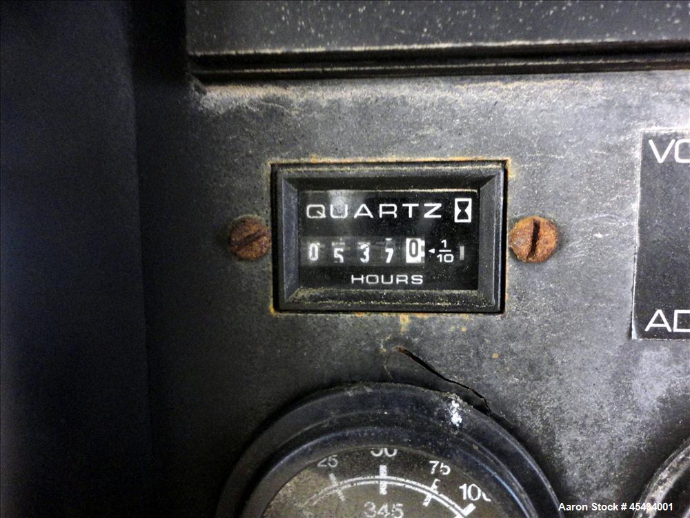 Used Kohler 80 kW Standby Natural Gas Generator Set, Model 80RZ72, Serial #388591. Ford LSG 875 engine rated 132 hp @ 1800 rpm, serial #07533 A-04-RH. 3/60/480V. Mainline circuit breaker. Coolant hea...