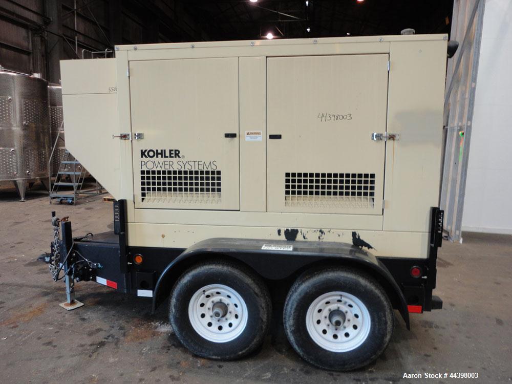 Used- John Deere / Kohler 55 kW standby (50 kW prime) diesel generator set, portable / trailer mounted, model 50REOZJB, SN-2...