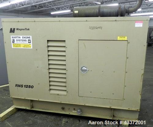 Used Magnetek 100 kW standby natural gas generator set, model RNS 1250 SN-PM078611. Ford model LSG-8751-6007-ZA engine SN-04053 L-28-RA. 3/60/208/240/480V or 1/60/120/240V. Main-line circuit breaker....