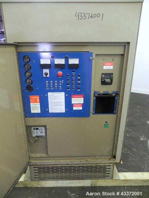 Used Magnetek 100 kW standby natural gas generator set, model RNS 1250 SN-PM078611. Ford model LSG-8751-6007-ZA engine SN-04053 L-28-RA. 3/60/208/240/480V or 1/60/120/240V. Main-line circuit breaker....